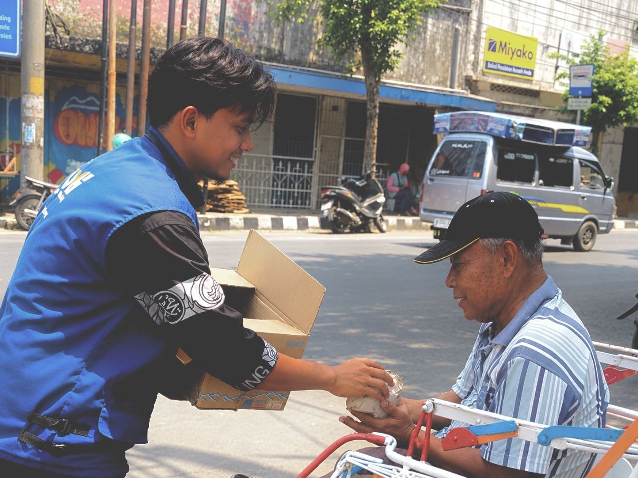 Woman holding donation box
